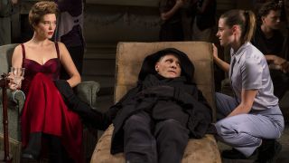 Léa Seydoux and Kristen Stewart both sit beside a lying Viggo Mortensen in Crimes of the Future.