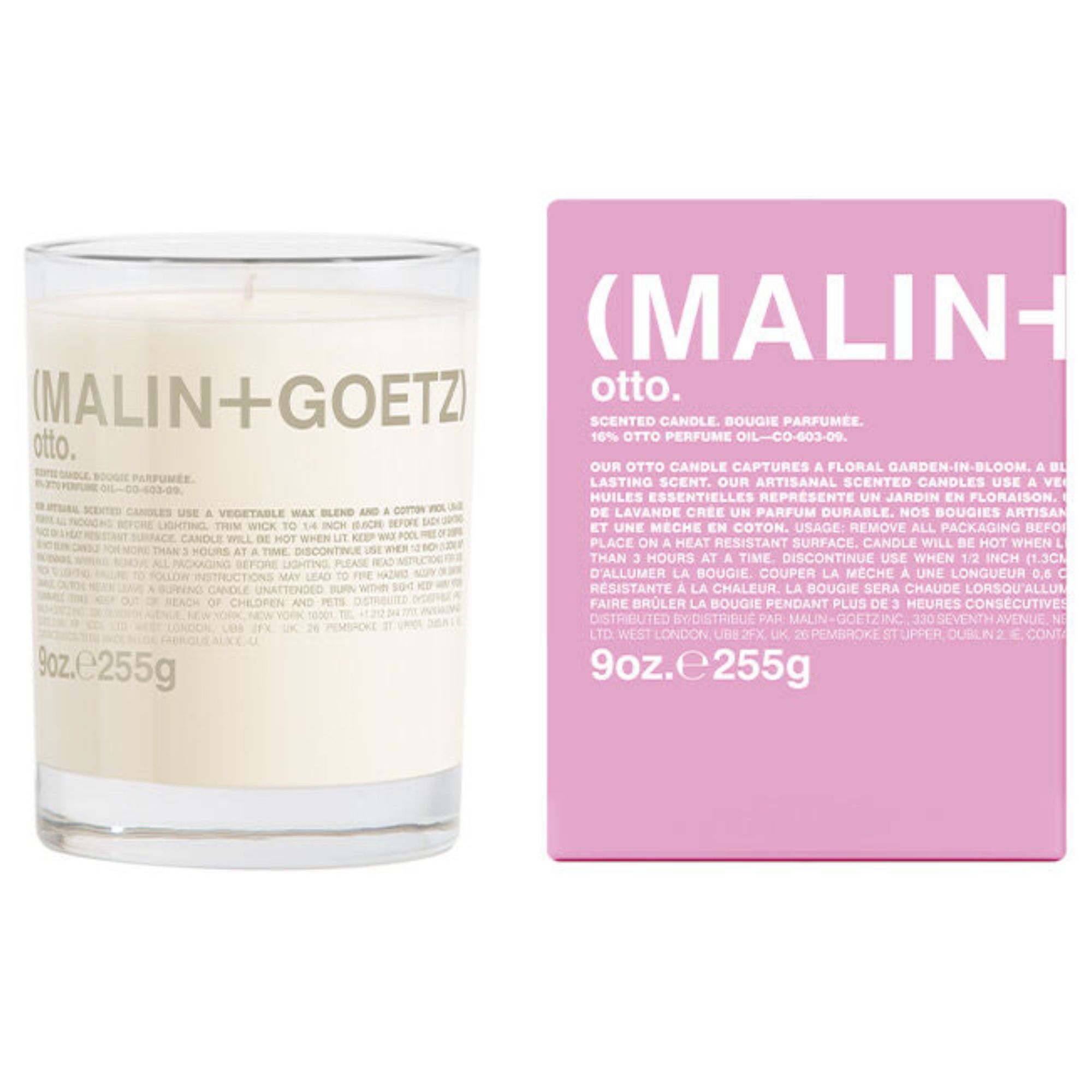 Malin+Goetz otto candle beside a pink cardboard packing box