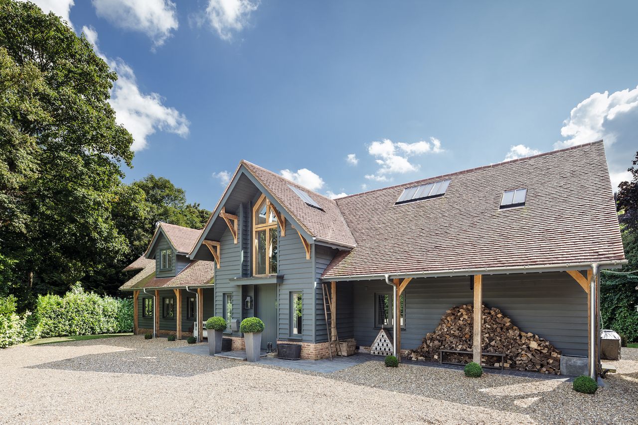blue timber cladding on barn style house