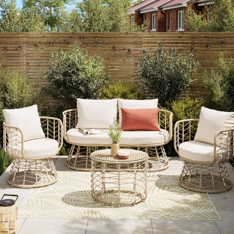 Omalos Matt Beige Rattan effect 4 Seater Coffee set styled on patio with rug, scatter cushion, plant