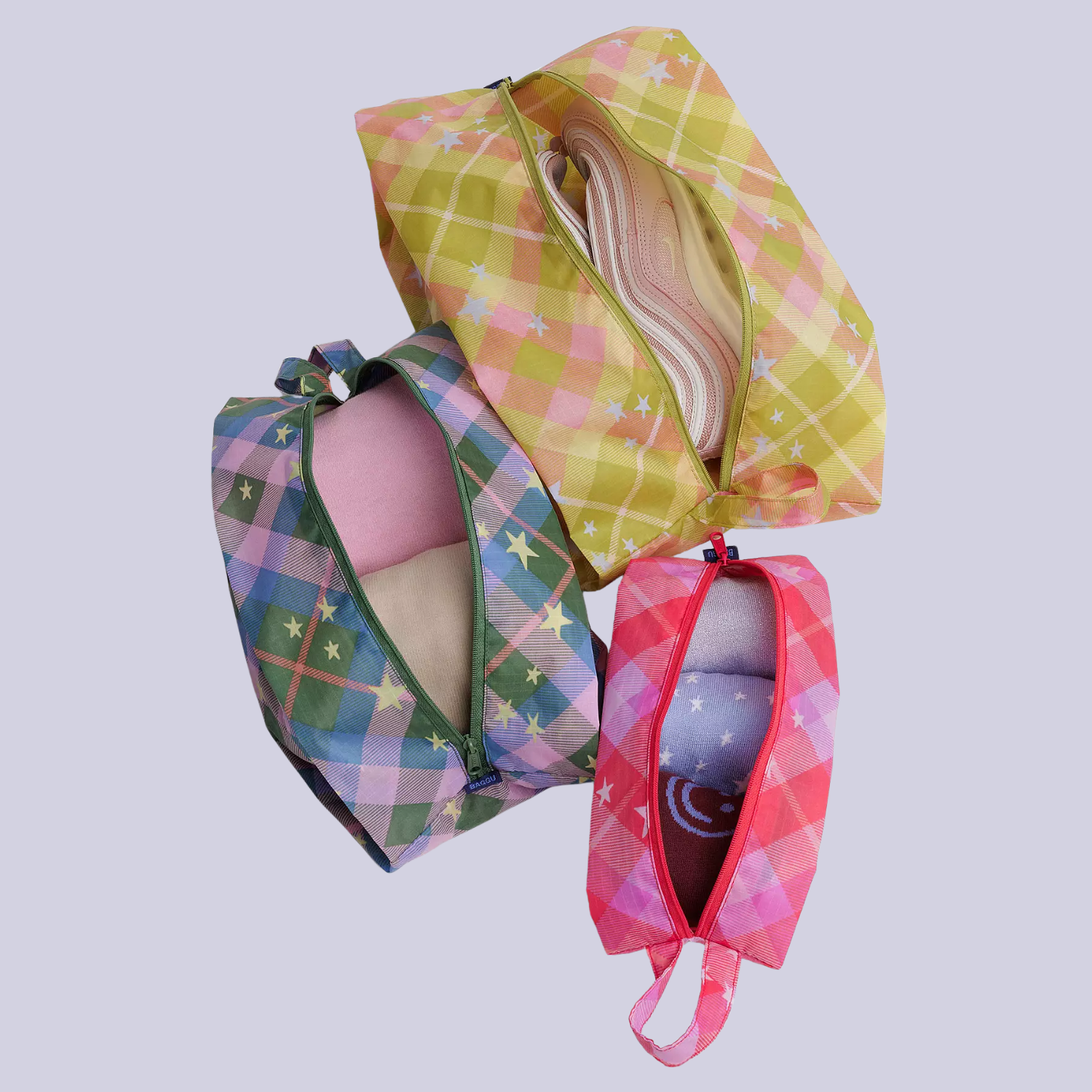 A set of three colorful star printed storage bags