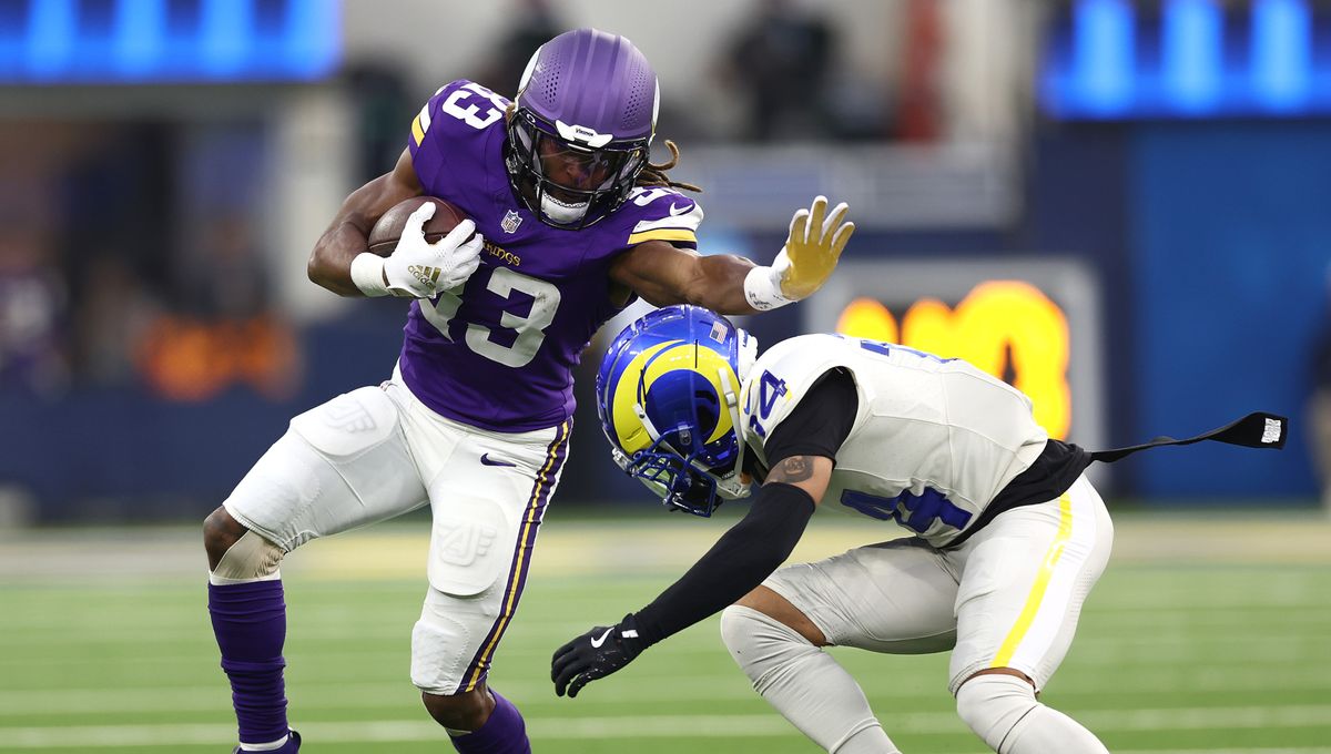 Minnesota Vikings&#039; Aaron Jones and Los Angeles Rams&#039; Cobie Durant