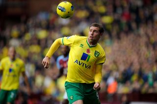 Grant Holt in action for Norwich City against Aston Villa in 2011.