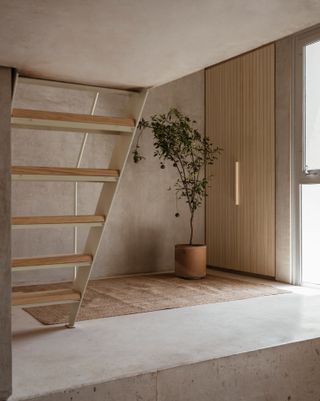 stairs and entrance at Domus Peepem housing by Kiltro Polaris
