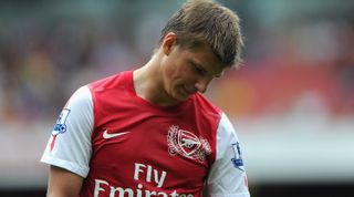 LONDON, ENGLAND - AUGUST 20: Andrey Arshavin of Arsenal dejected during the Barclays Premier League match between Arsenal and Liverpool at the Emirates Stadium on August 20, 2011 in London, England. (Photo by Michael Regan/Getty Images)