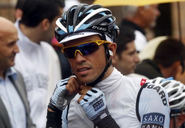 Alberto Contador gets ready for a day in the rain