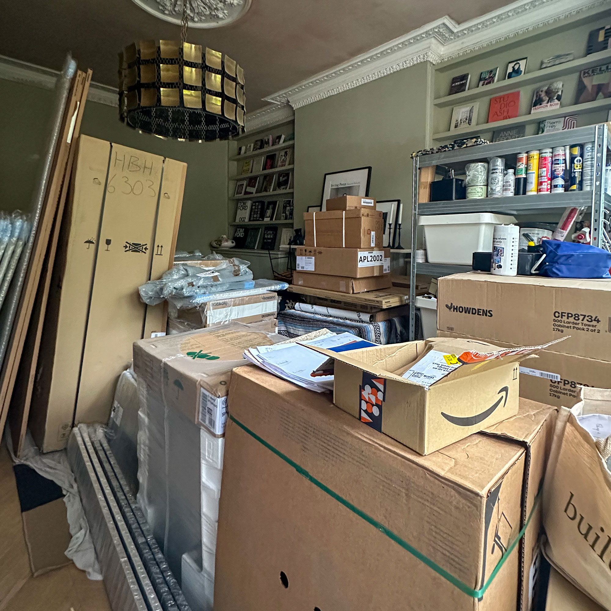 Cardboard moving boxes in living room