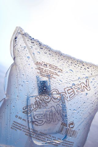 Sunscreen perfume by ERL and Comme des Garcons in plastic bag