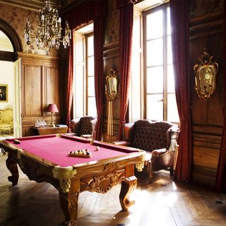 room with pink pool table