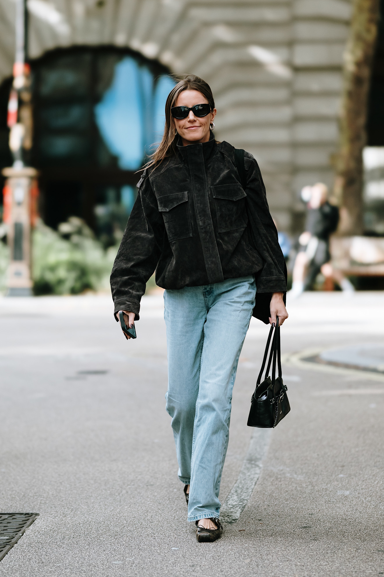 London Fashion Week attendees wears suede bomber jackets