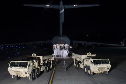 The U.S. deploys the first part of the THAAD missile defense system in South Korea