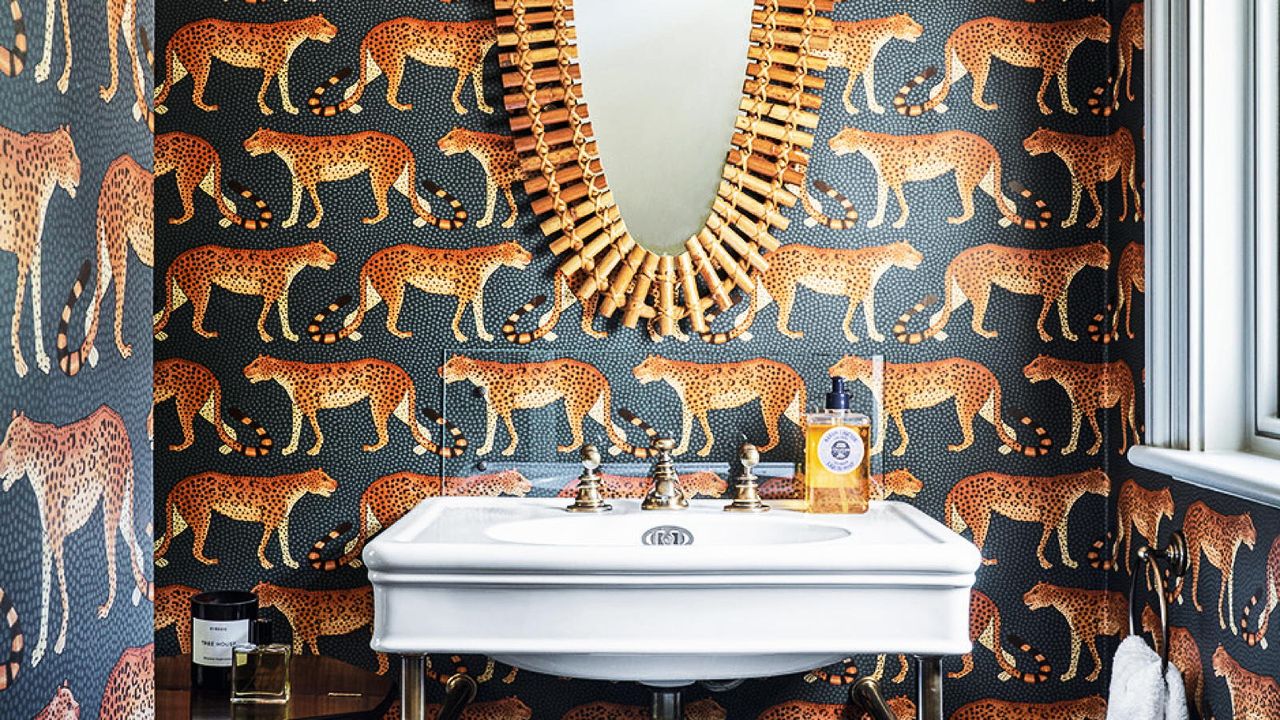 downstairs toilet wallpaper ideas with leopard wallpaper and wood mirror