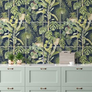 botanical print wallpaper in green kitchen