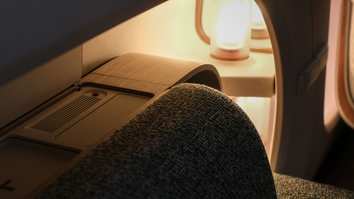 Arm rest and light in a car