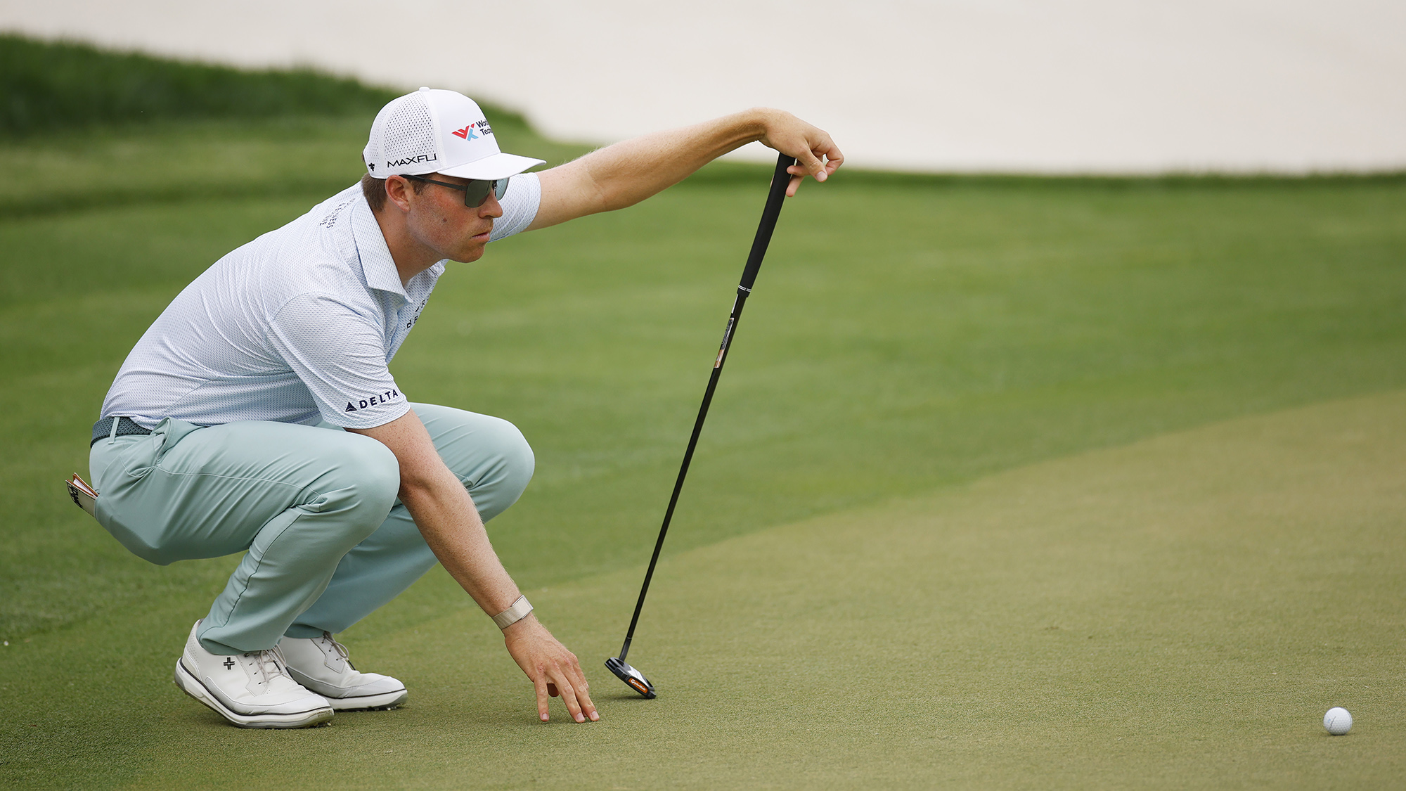ORLANDO, FLORIDA - MARCH 05: Ben Griffin of the United States lines up a putt on the 18th green during the first round of the Arnold Palmer Invitational presented by Mastercard 2026 at Arnold Palmer Bay Hill Golf Course on March 05, 2026 in Orlando, Florida. (Photo by Mike Ehrmann/Getty Images)