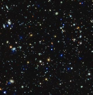 This compound image of the Hubble Ultra Deep Field region depicts glowing halos of gas around galaxies discovered by the Muse instrument on the European Southern Observatory's Very Large Telescope.