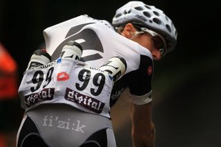 Daniel Lloyd with Cervélo TestTeam carries water bottles to team mates