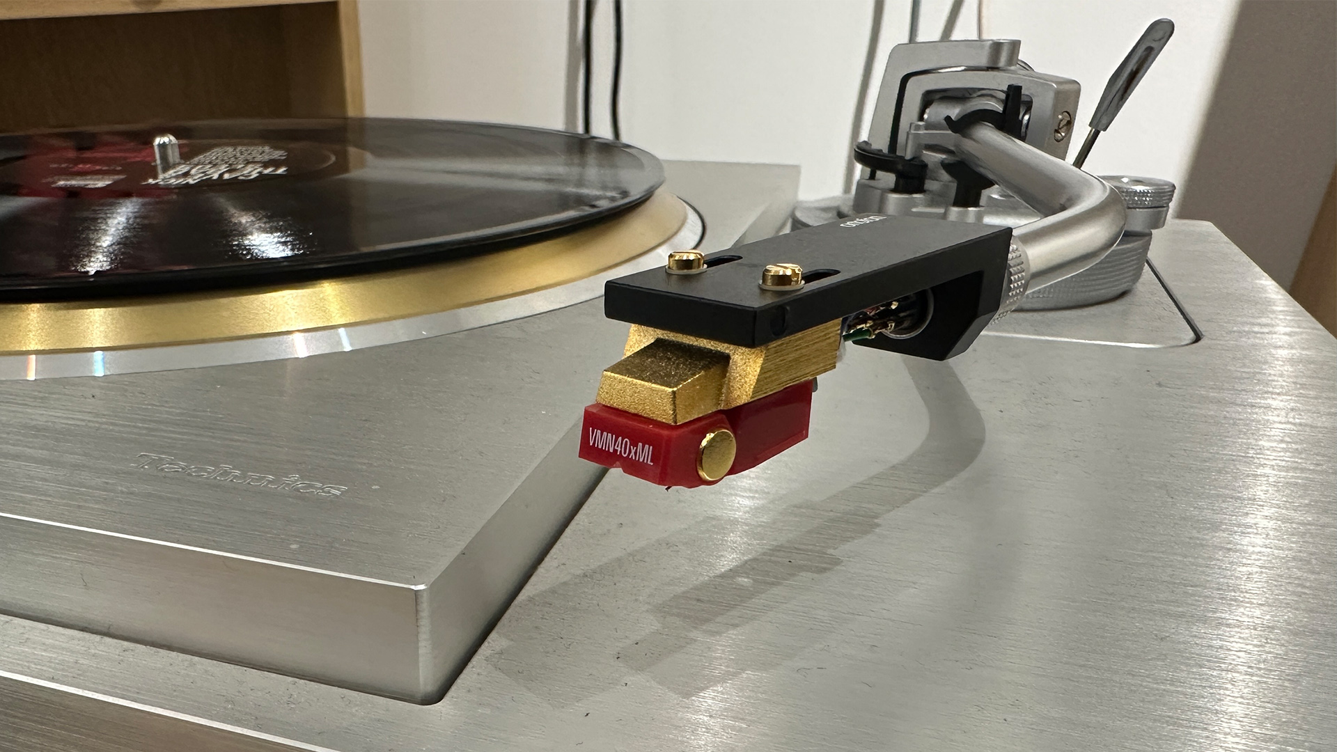 Audio-Technica AT-VM740xML moving magnet cartridge attached to Technics turntable tonearm