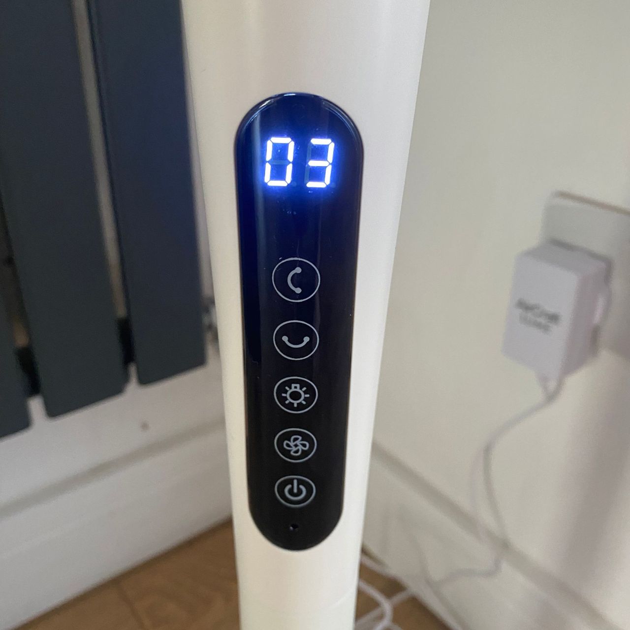 Display panel of the AirCraft LUME Quiet Air Circulator Fan showing 5 buttons and a wind speed of 3