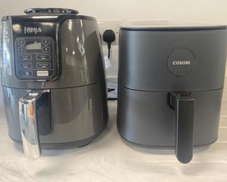 A Ninja AF101 and Cosori Pro LE air fryer in the Winnersh Triangle, Reading, UK office