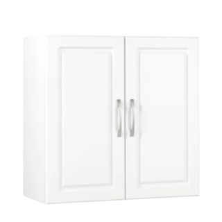 A white wooden wall cabinet with two embossed panels and two silver handles on the doors