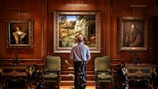 A viewer savors a moment with Bellini’s ‘St. Francis.’