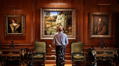 A viewer savors a moment with Bellini&rsquo;s &lsquo;St. Francis.&rsquo;