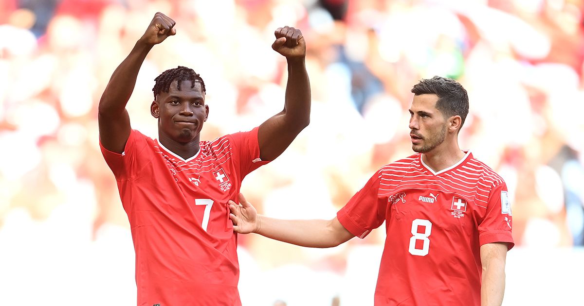 Breel Embolo (L) of Switzerland celebrates scoring their first goal with their teammate Remo Freuler (R) during the FIFA World Cup Qatar 2022 Group G match between Switzerland and Cameroon at Al Janoub Stadium on November 24, 2022 in Al Wakrah, Qatar.