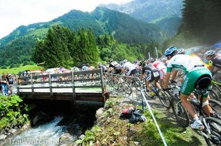 Racers roll out just after the start of the Champery World Cup.