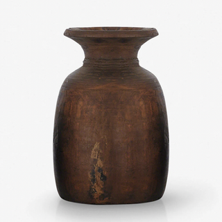 A wooden vase