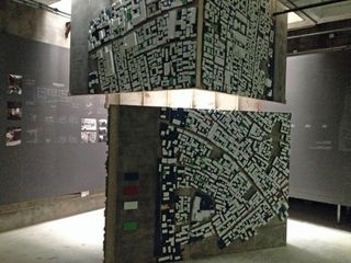 the firm’s exhibition also included a sculptural map and additions to the courtyard houses