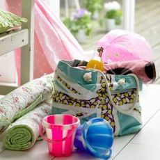 plastic bottle with toys and bucket