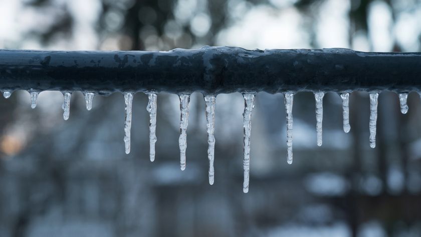 Icicles hanging off a pipe