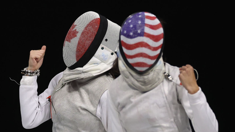  Lee Kiefer of Team United States, wearing a Stars and Stripes fencing mask, prepares for the fencing live stream at Olympics 2024