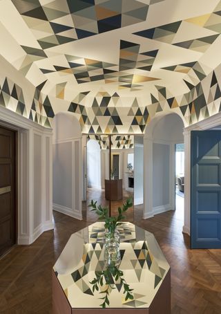 Ceiling painted in traditional Scandinavian geometric patterns