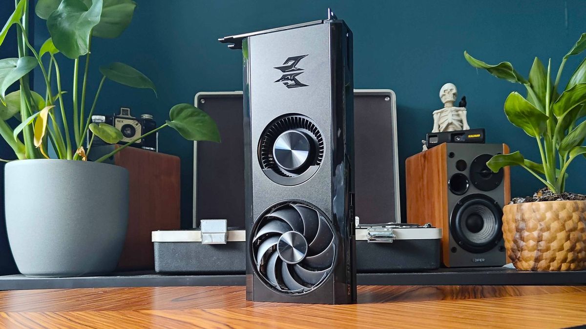 AMD Radeon RX 7600 graphics card sitting vertically upright on table