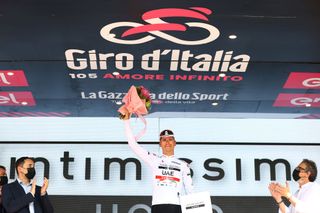 TURIN ITALY MAY 21 Joo Almeida of Portugal and UAE Team Emirates White Best Young Rider Jersey celebrates at podium during the 105th Giro dItalia 2022 Stage 14 a 147km stage from Santena to Torino Giro WorldTour on May 21 2022 in Turin Italy Photo by Michael SteeleGetty Images