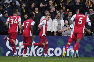 Odegaard (centre) put Arsenal ahead in their win at Watford.