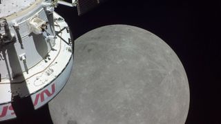 moon with spacecraft in foreground