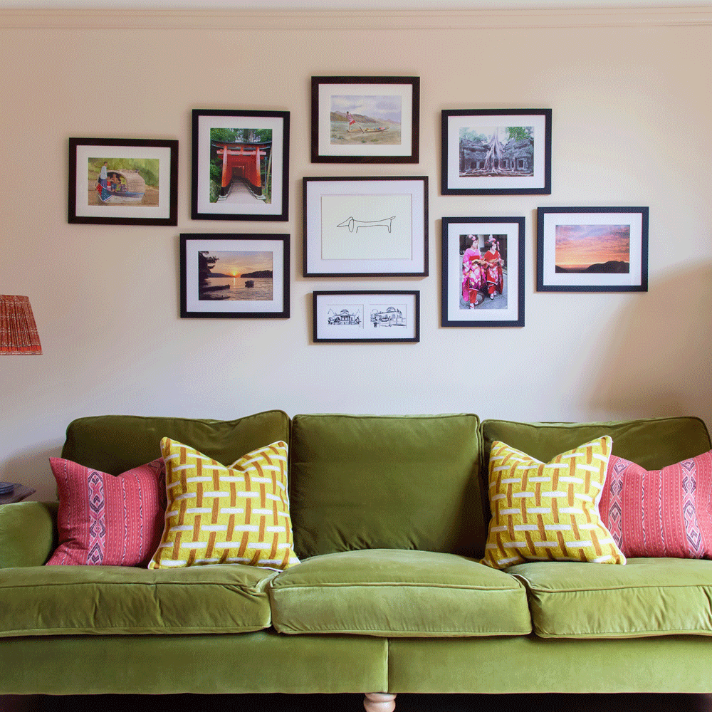sitting room with green sofa and pink cushion