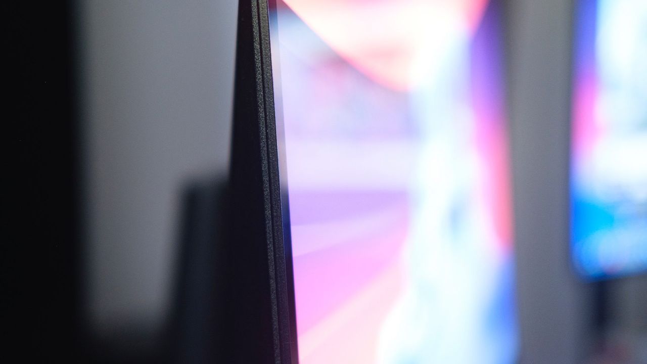 Side profile view of AOC GAMING Q27G4ZD monitor.