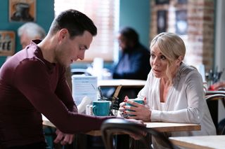 Sharon Watts and Zack Hudson in the cafe.