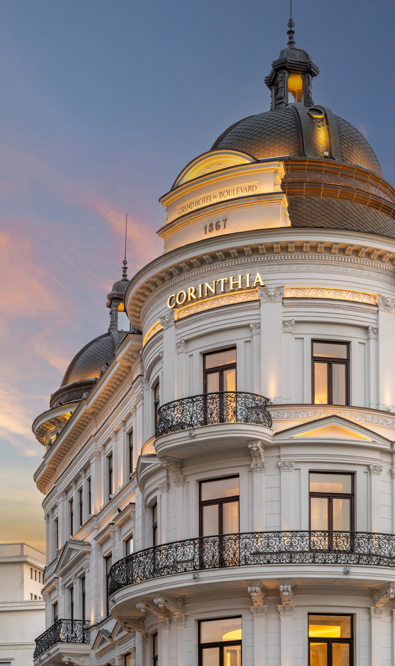 The facade of the hotel, resplendent in white