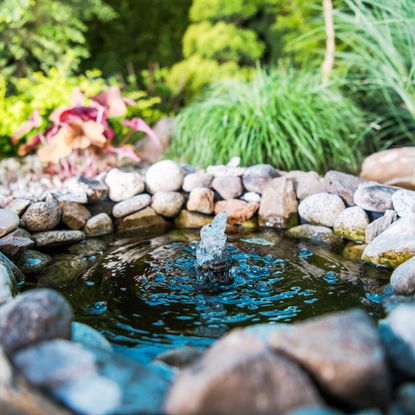 small garden pond ideas micro pond with fountain and rock edges in garden