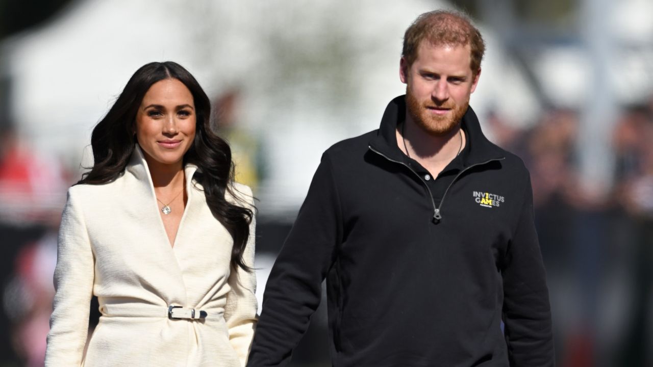 Prince Harry &quot;disappointed&quot; after Meghan Markle&#039;s first meeting with the Spencers, seen here with Meghan attending athletics event 