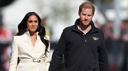Prince Harry "disappointed" after Meghan Markle's first meeting with the Spencers, seen here with Meghan attending athletics event 