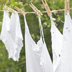 White clothes hanging on a washing line.