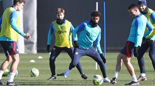 Lamine Yamal (centre) in Barcelona training.