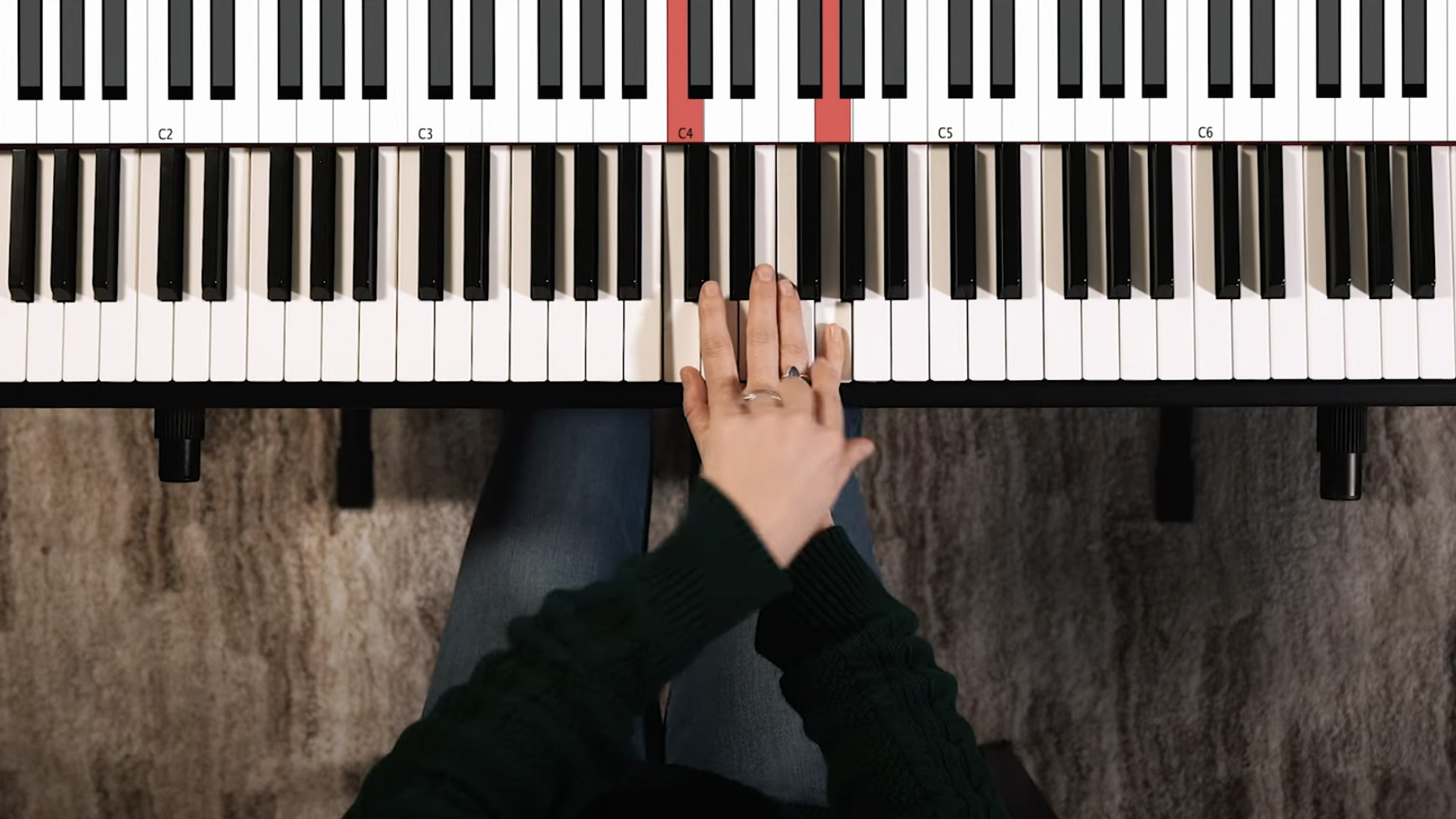 Overhead shot of hands on a keyboard