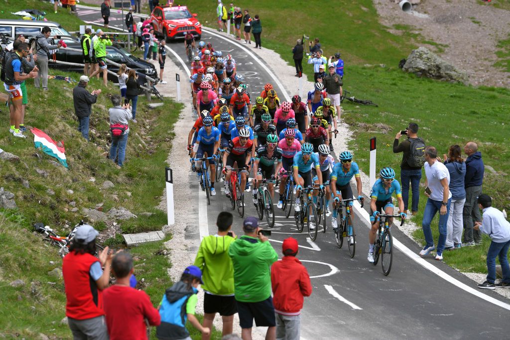 Astana lead the peloton on the Passo Manghen